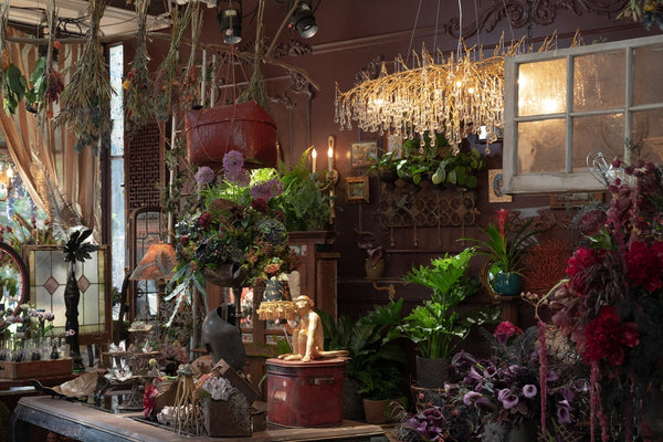 Ooze Chandelier featured in It Ends With Us movie in Lily Bloom's flower shop scene