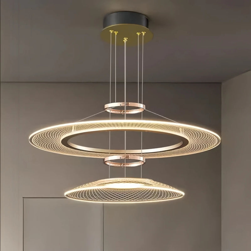 Dröme modern LED chandelier with sculptural acrylic rings and soft ambient glow, Nordic-style ceiling light ideal for living rooms, bedrooms, stairwells, and hotel lobbies.