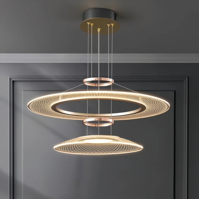 Dröme modern LED chandelier with sculptural acrylic rings and soft ambient glow, Nordic-style ceiling light ideal for living rooms, bedrooms, stairwells, and hotel lobbies.
