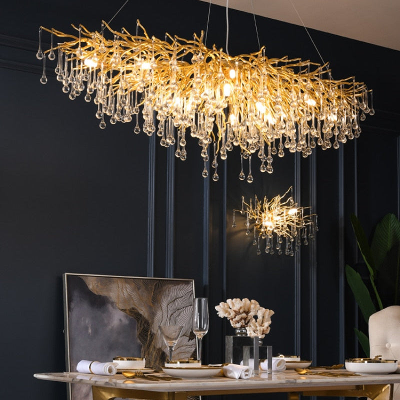 Lights of Scandinavia - ooze - "-What on earth is that majestic being hanging from the ceiling?"  Majestic crystal chandelier. Unique lighting for dining rooms, living areas, entrance halls, hotel areas, restaurants, etc.    K9 crystals with silver/gold metal plated aluminum frame. - A work of art.  2 sizes - 2 colors L120cm: L120xW50xH35cm, 12-25m2 L160cm: L160xW55xH35cm, 16kg, 15-30m2